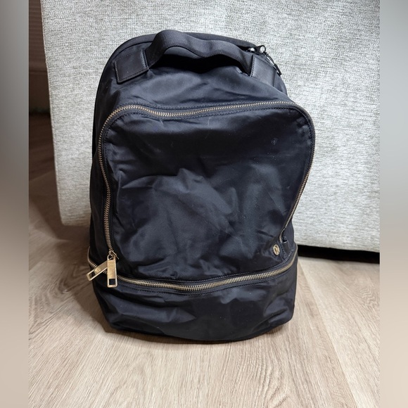 lululemon athletica Other - Lululemon Athletica Black Backpack with Gold Accents